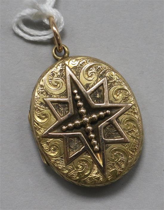 An Edwardian high carat gold oval pendant locket, 28mm.